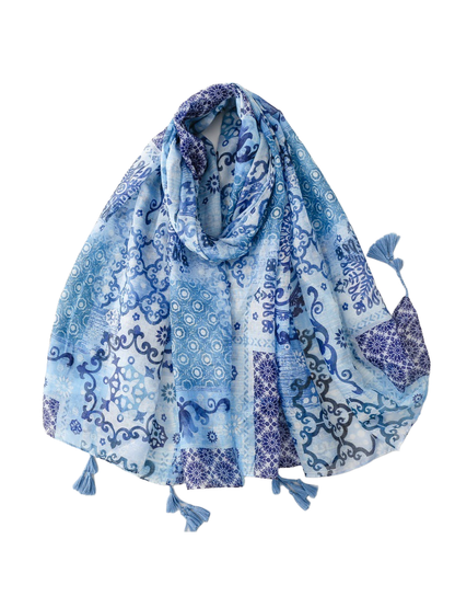 Blue patchwork-pattern scarf arranged in a flowing draped display