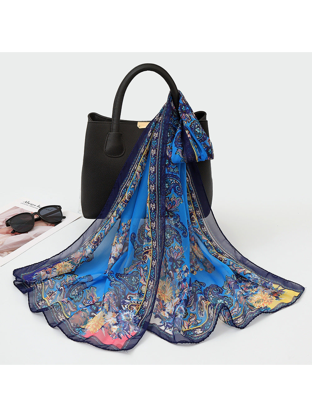 Blue sheer scarf with paisley, floral motifs and a navy ornamental border