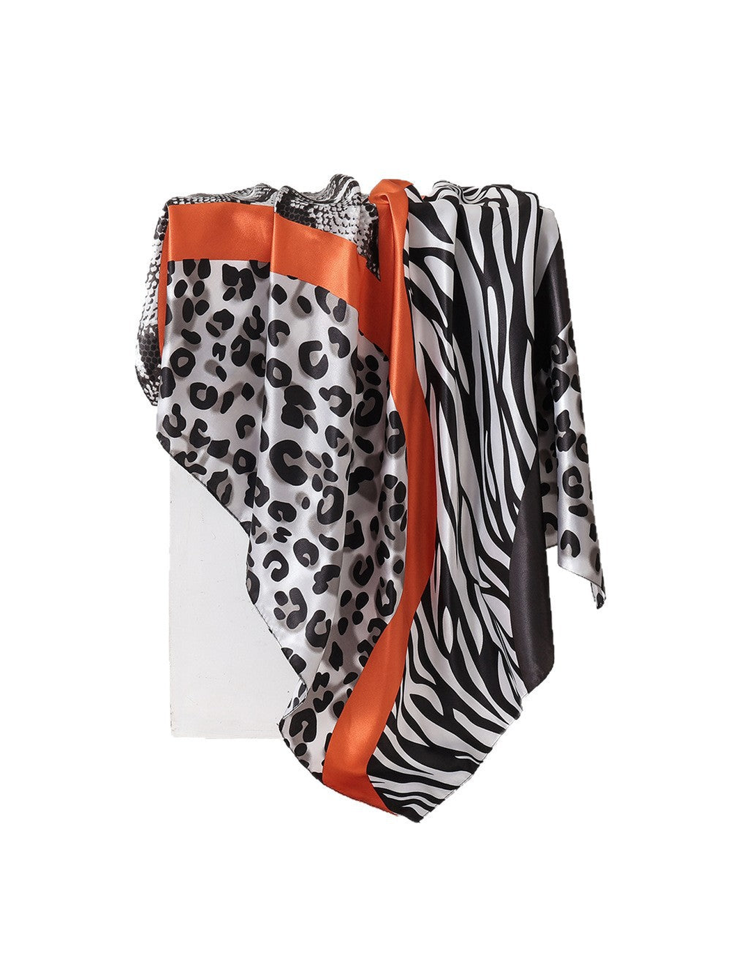 Gray animal-print square scarf with orange trim, draped view