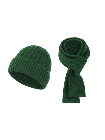 Dark green cable-knit hat and scarf set on a white background