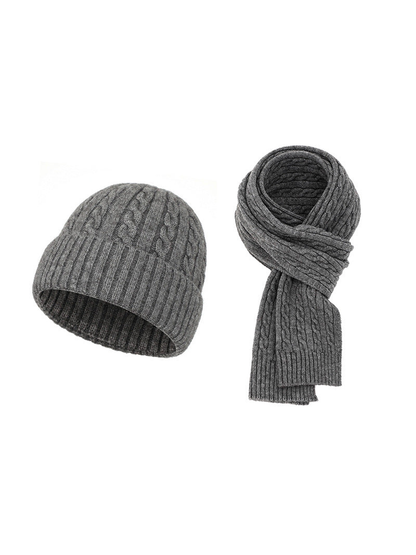 Heather gray cable-knit hat and scarf set on a white background