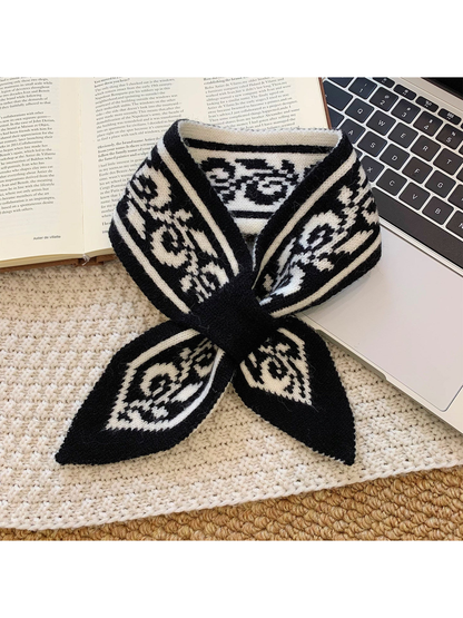 Black and cream paisley pull-through scarf in a tied display