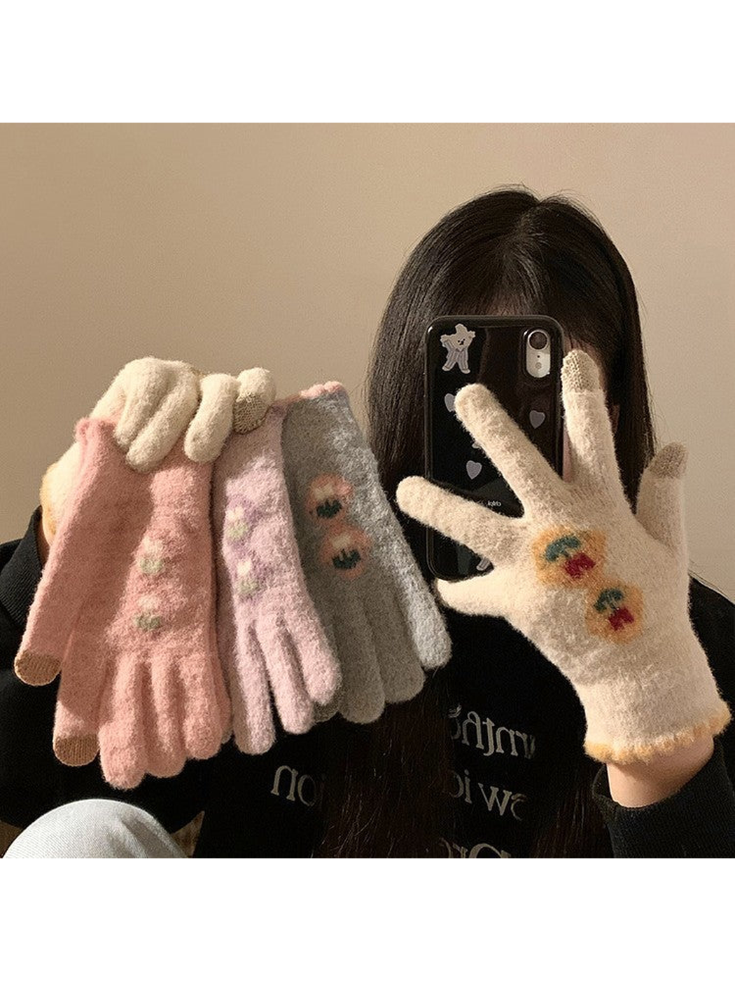 Cream gloves worn beside pink, purple and gray color options