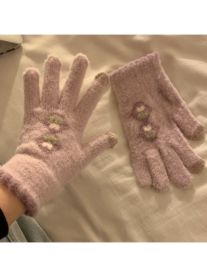 Light purple fuzzy gloves with stacked floral motifs and contrasting fingertips