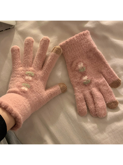 Dusty pink fuzzy gloves with stacked floral motifs and contrasting fingertips