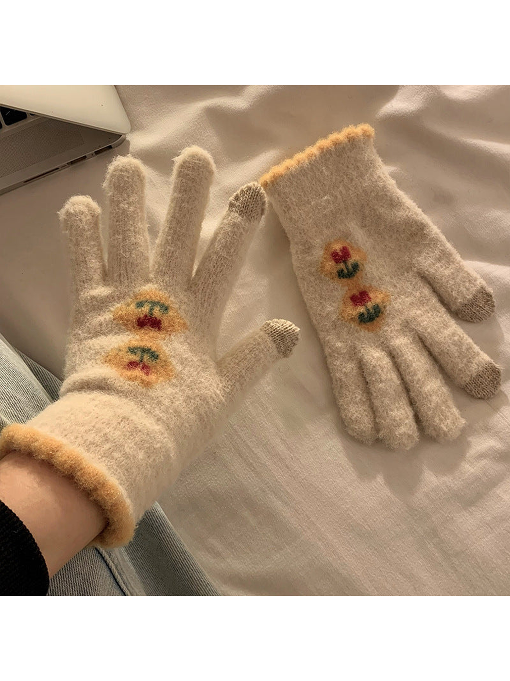 Cream fuzzy gloves with stacked floral motifs and golden trim