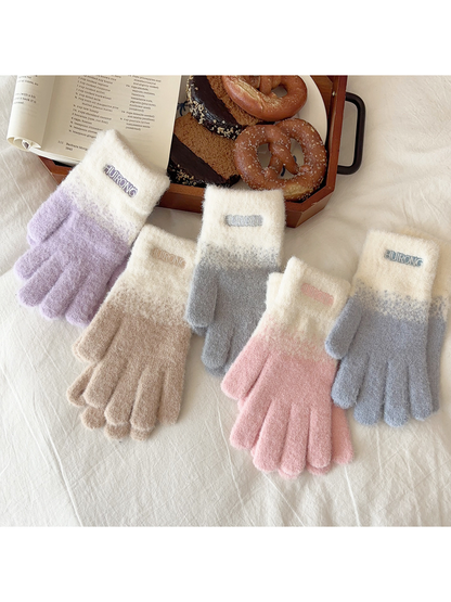Pink, blue, gray, purple and beige two-tone fuzzy gloves displayed together