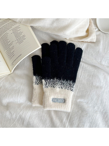 Black two-tone fuzzy gloves with cream extended cuffs
