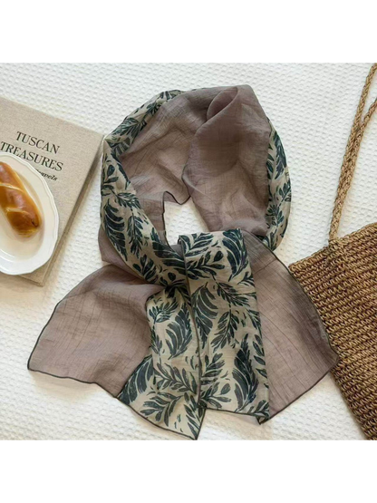 Light coffee sheer scarf with contrasting green leaf-print panels