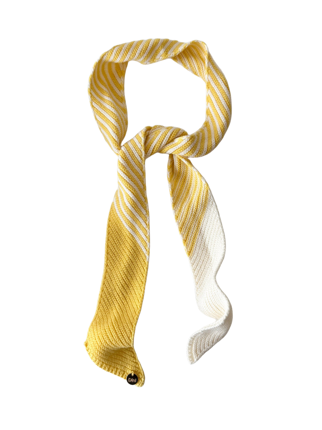 Yellow and ivory striped skinny scarf tied in a loose knot