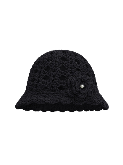 Black openwork beanie with scalloped brim and flower applique, front view
