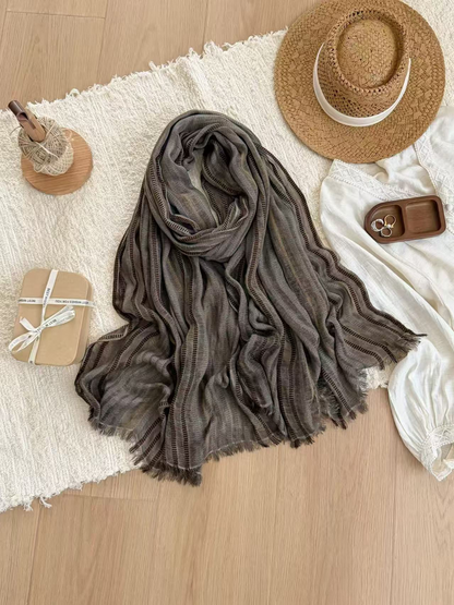 Khaki striped scarf with openwork bands and fringed ends