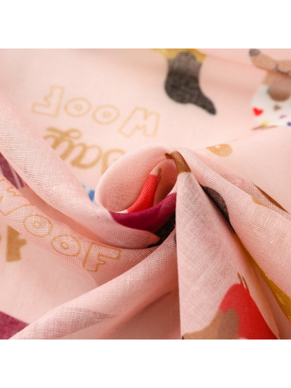Close-up of the scarf's fine translucent weave and overlapping folds