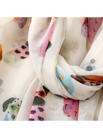 Close-up of softly gathered scarf folds and cartoon dog print
