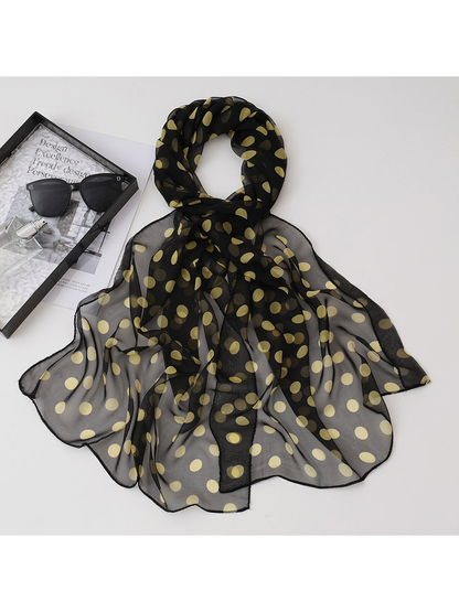 Black sheer scarf with pale yellow polka dots, draped view