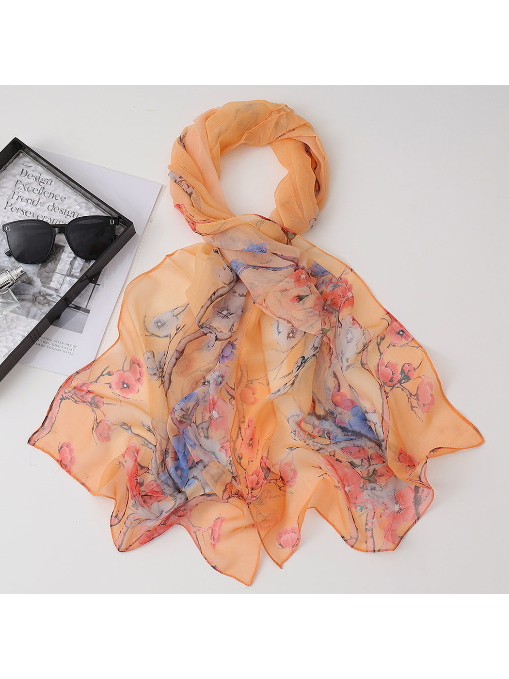 Orange sheer scarf with pink and blue floral branches