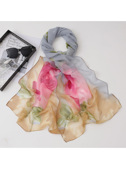 Gray floral scarf with pink blossoms and tan accents