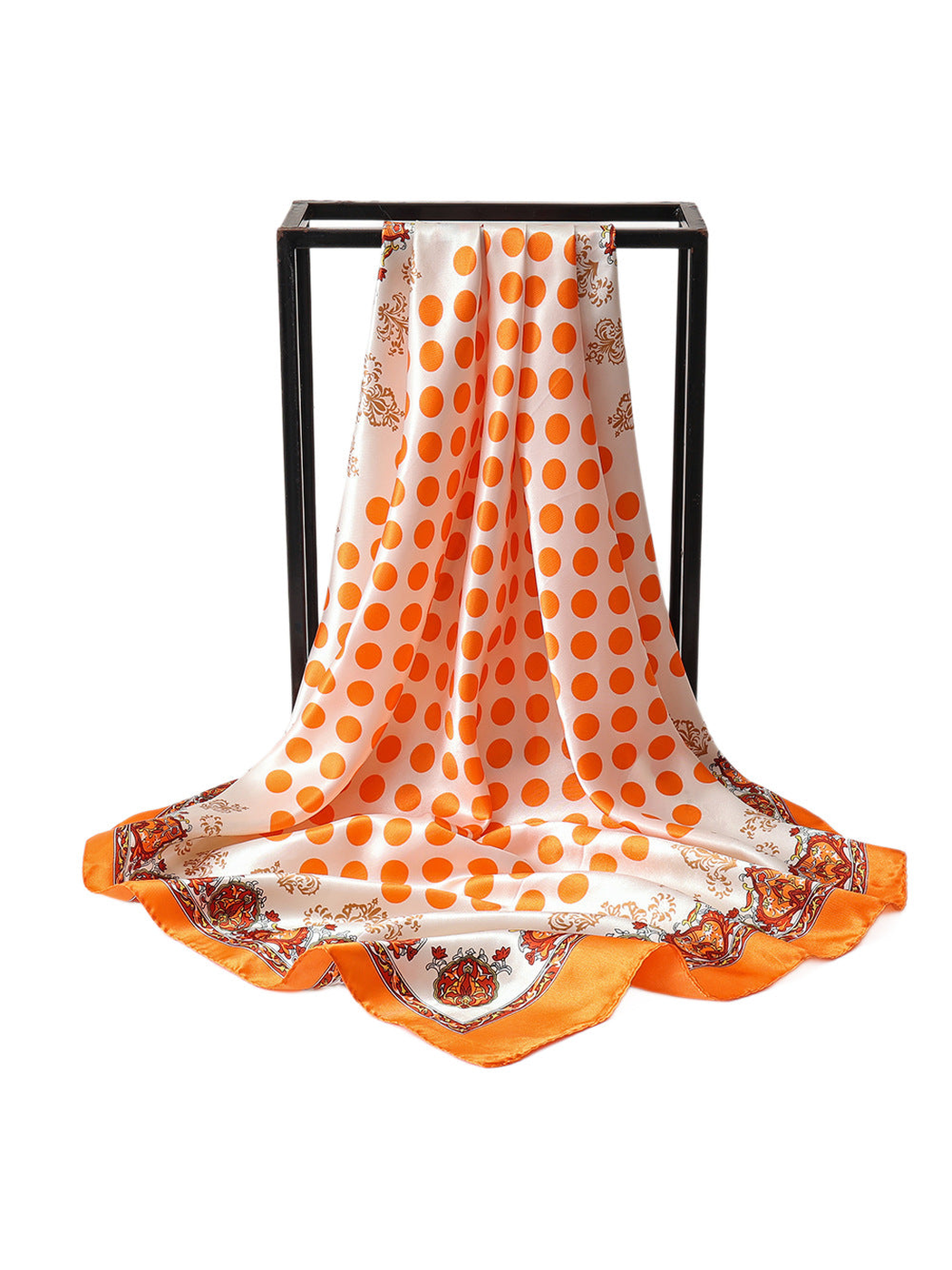 Orange and cream polka dot square scarf with ornamental border, draped view
