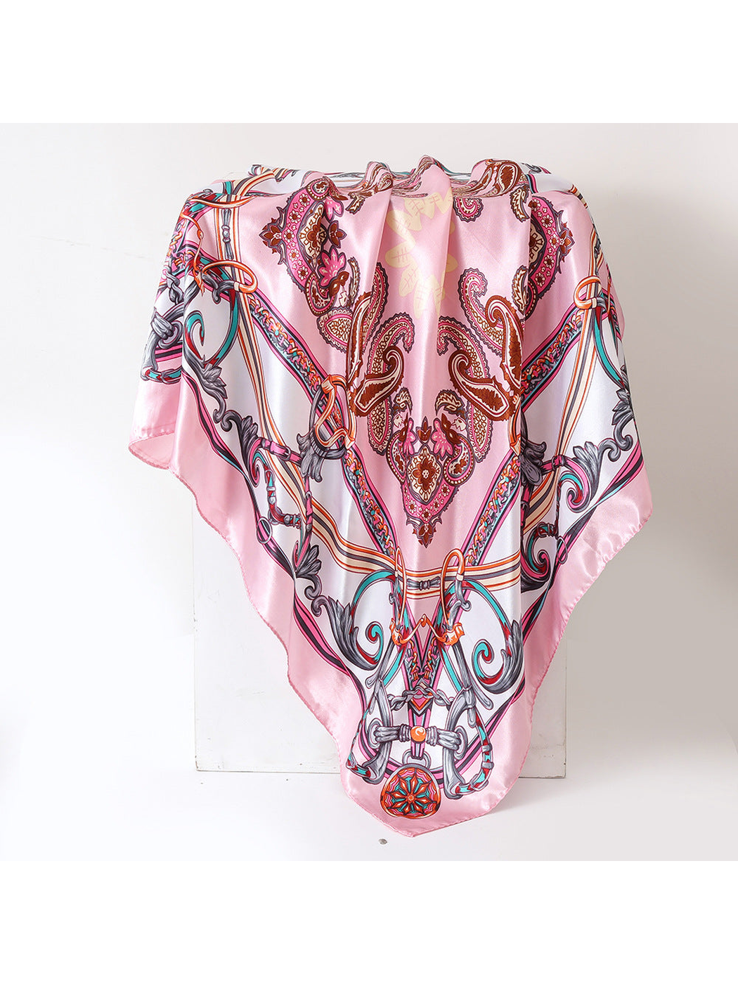 Pink square scarf with paisley and ornamental chain pattern