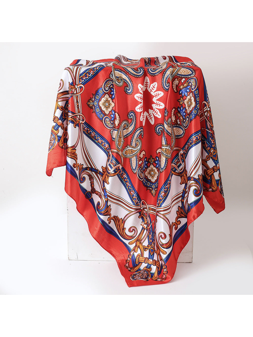 Red square scarf with paisley and ornamental chain pattern