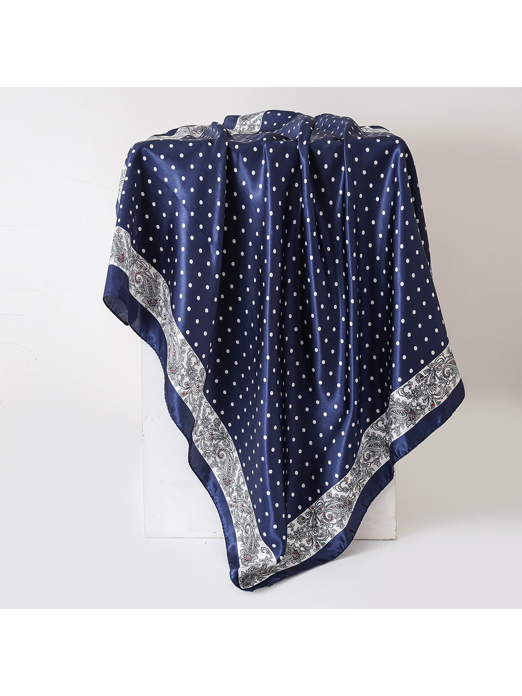 Navy square scarf with white polka dots and paisley border