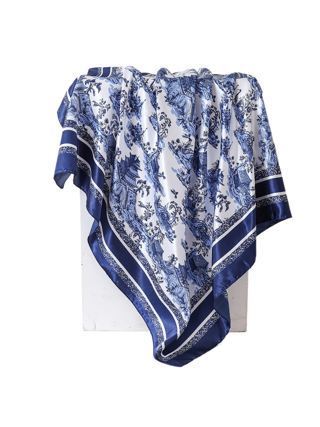 Blue and white architectural landscape square scarf displayed in a full draped view