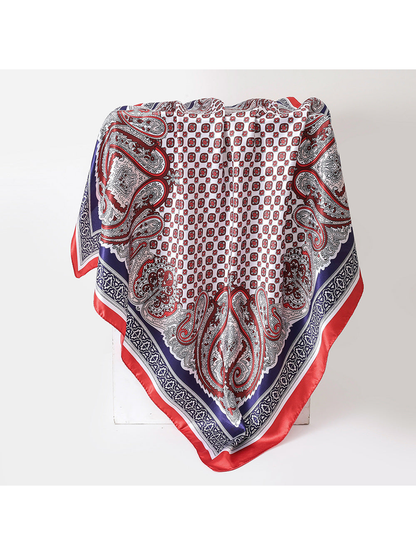 Red paisley square scarf displayed in a full draped view