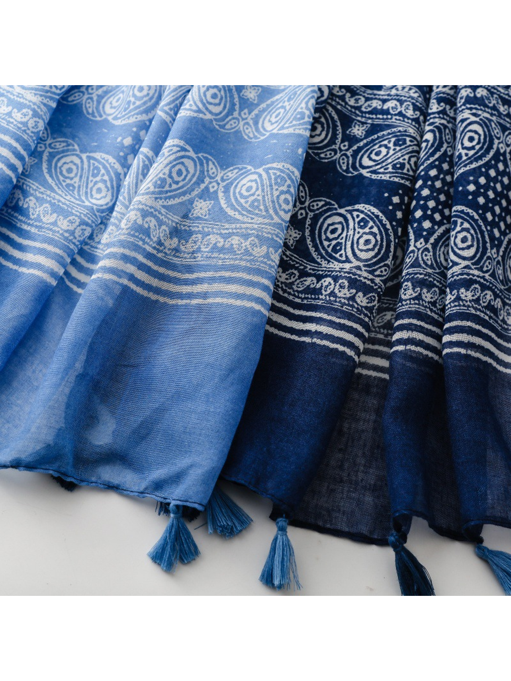 Close-up of the blue scarf border and small edge tassels