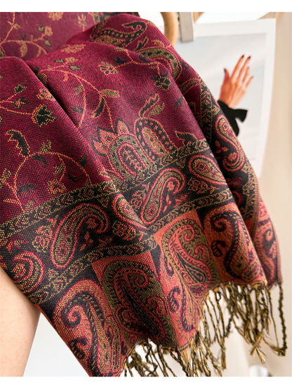 Close-up of the woven paisley pattern and ornamental border