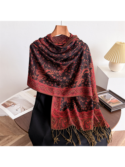 Charcoal black paisley scarf with vivid red patterning and fringed ends