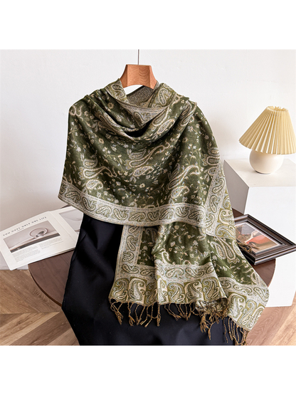 Army green paisley scarf draped on a display form with fringed ends