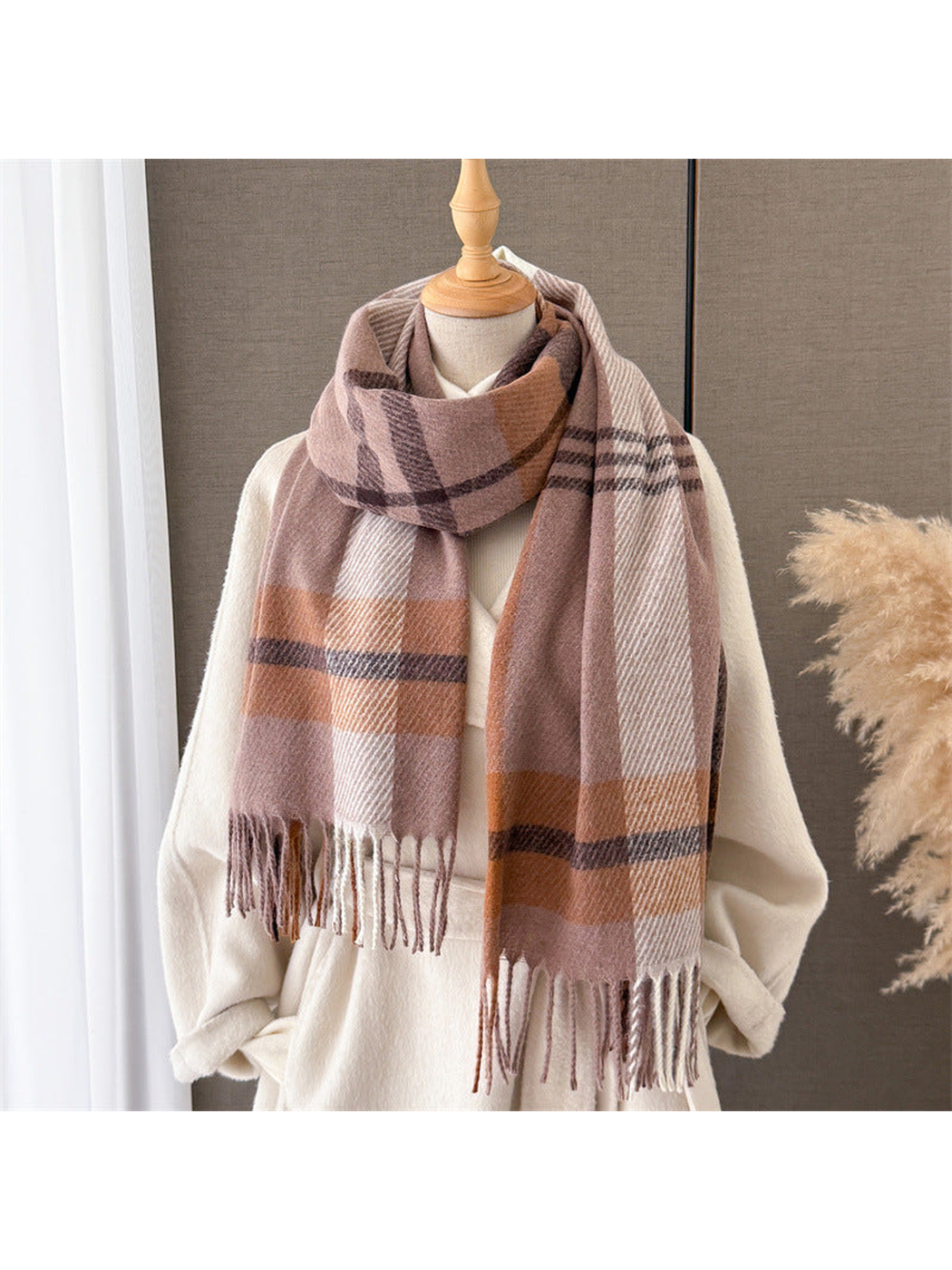 Light coffee plaid scarf styled over a cream coat