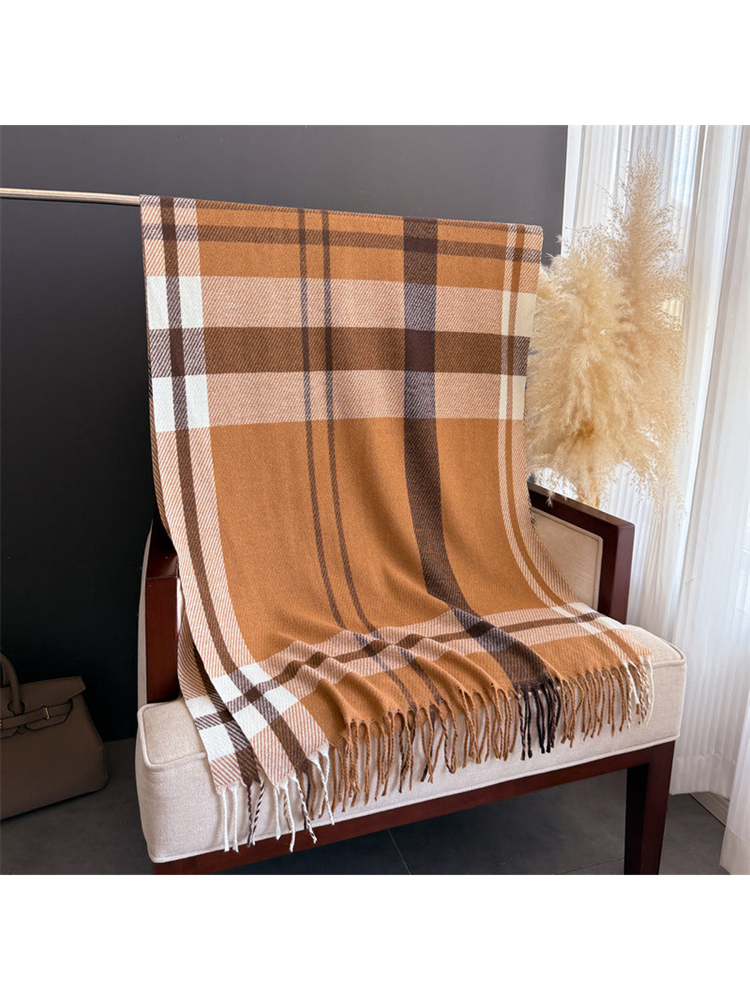 Camel plaid scarf displayed full length with fringed ends