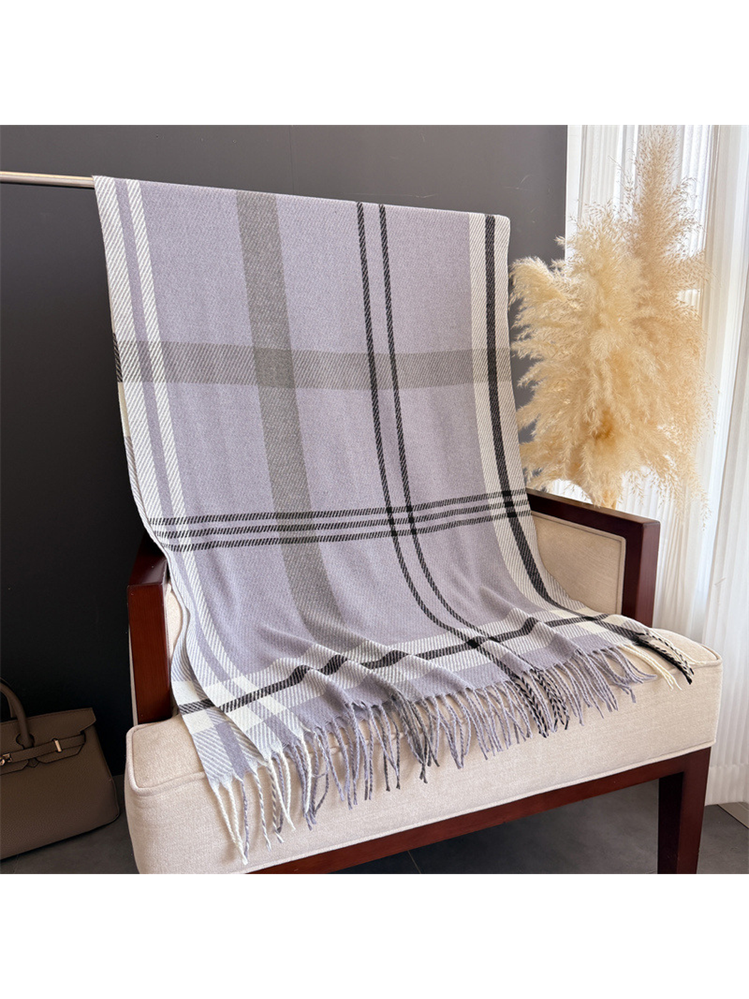 Light gray plaid scarf displayed full length with black and ivory stripes