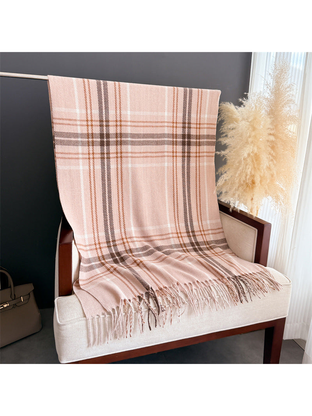 Blush plaid fringed scarf displayed at full length