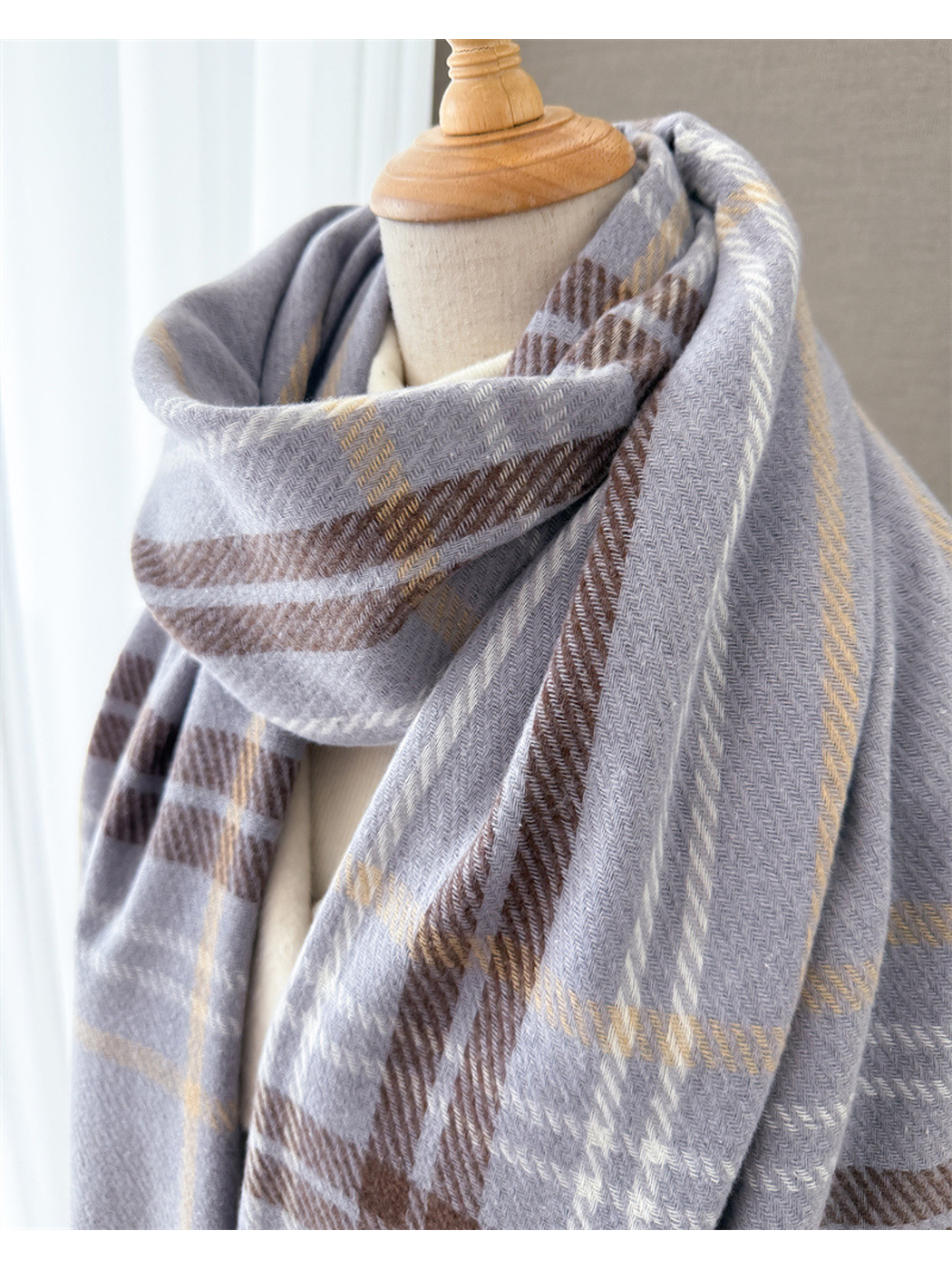 Close-up of the gray scarf weave and intersecting plaid lines