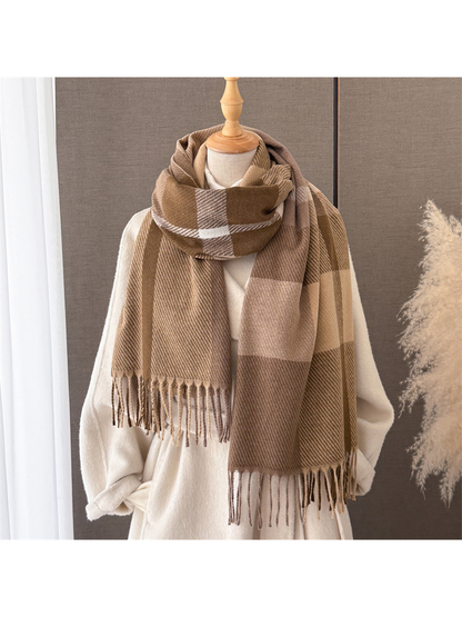 Caramel and beige plaid scarf styled on a cream mannequin
