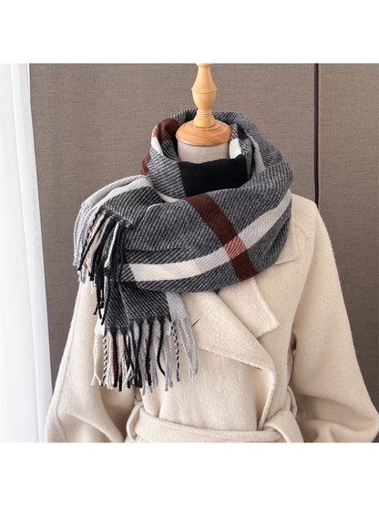 Charcoal, white and rust plaid scarf wrapped on a mannequin