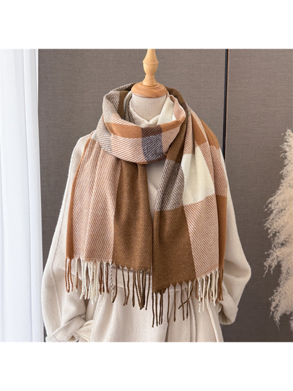 Brown, caramel and ivory plaid scarf styled on a cream mannequin