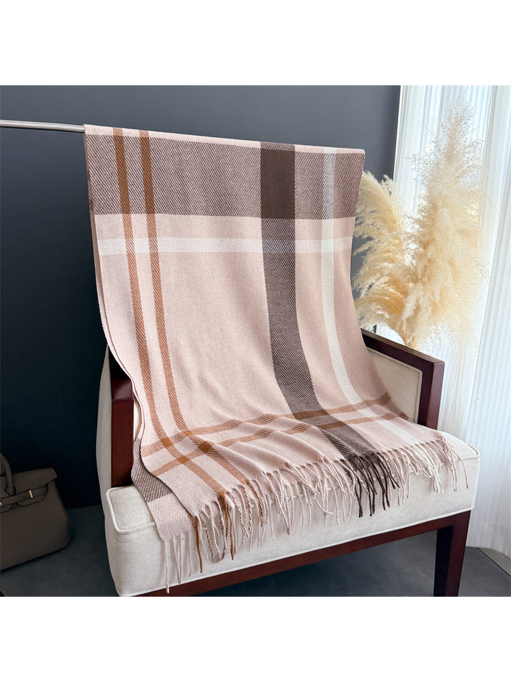 Blush pink plaid rectangular scarf with fringe displayed full length