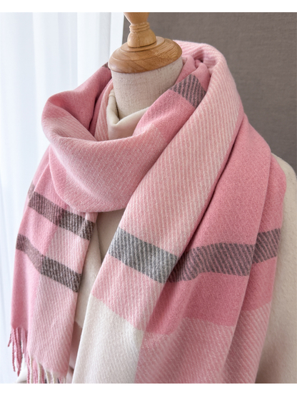 Close-up of the pink plaid scarf wrapped around a mannequin
