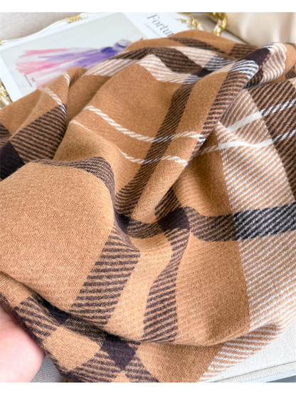 Close-up of the camel plaid scarf's fine herringbone texture