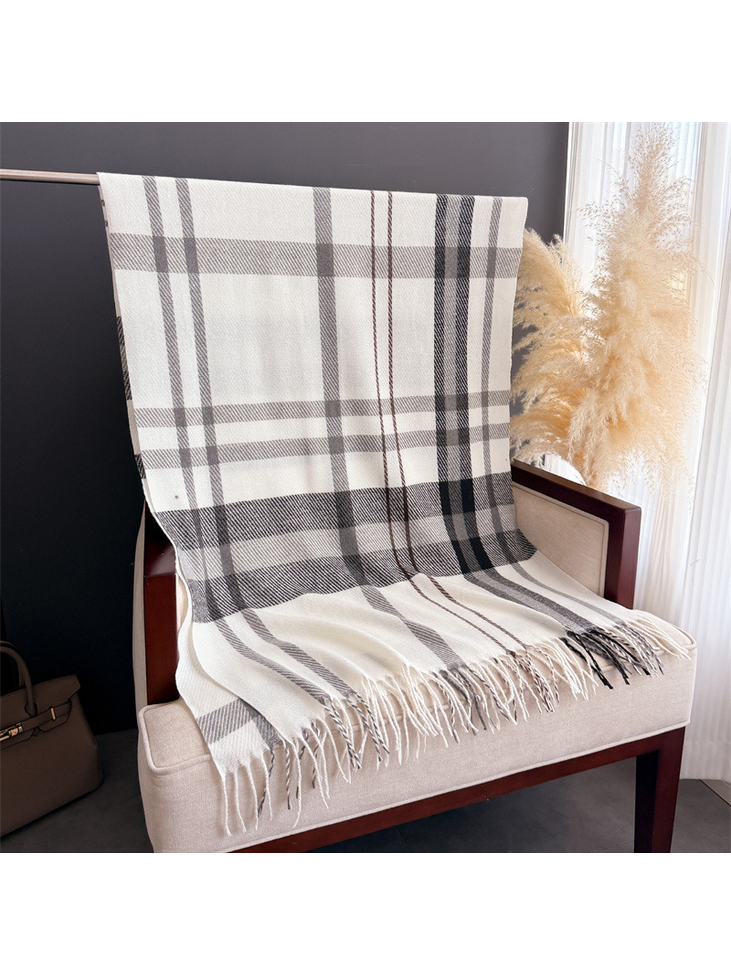 Ivory plaid rectangular scarf displayed flat with fringed ends