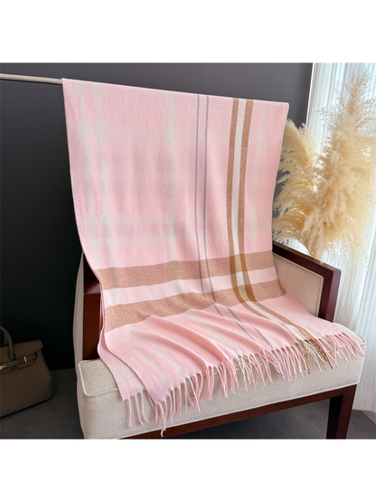 Light pink plaid rectangular scarf displayed flat with fringed ends