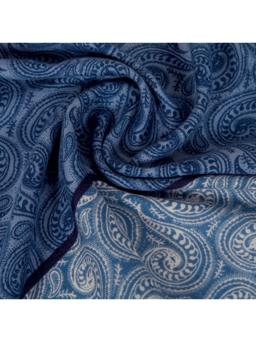 Close-up of the blue paisley pattern and woven-look texture