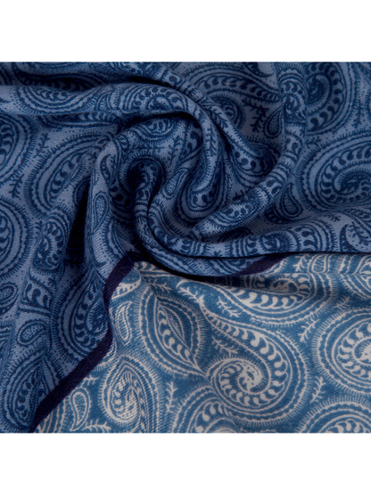 Close-up of the blue paisley pattern and woven-look texture