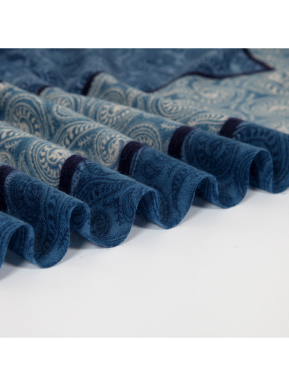 Close-up of the blue paisley scarf edge and short fringe
