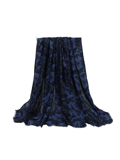 Blue scarf with black floral and butterfly motifs, draped view