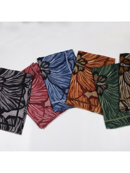 Six floral scarf color options displayed folded together