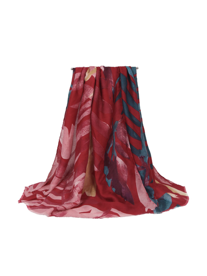 Red abstract botanical scarf with blue and pink accents, draped view